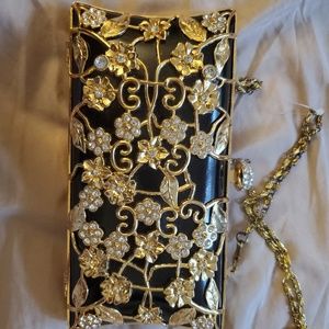Black and gold purse unique with flower detail